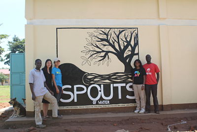 Kathy Ku (third from left) and her team standing in front of the first SPOUTS factory in Kumi, Uganda. (Courtesy of Kathy Ku)