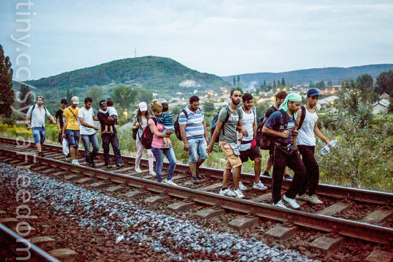 Refugees-walking-on-tracks