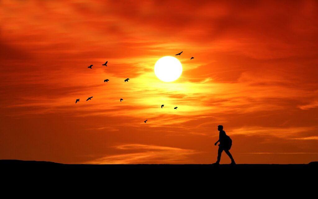 Lonesome man walking into the sunset