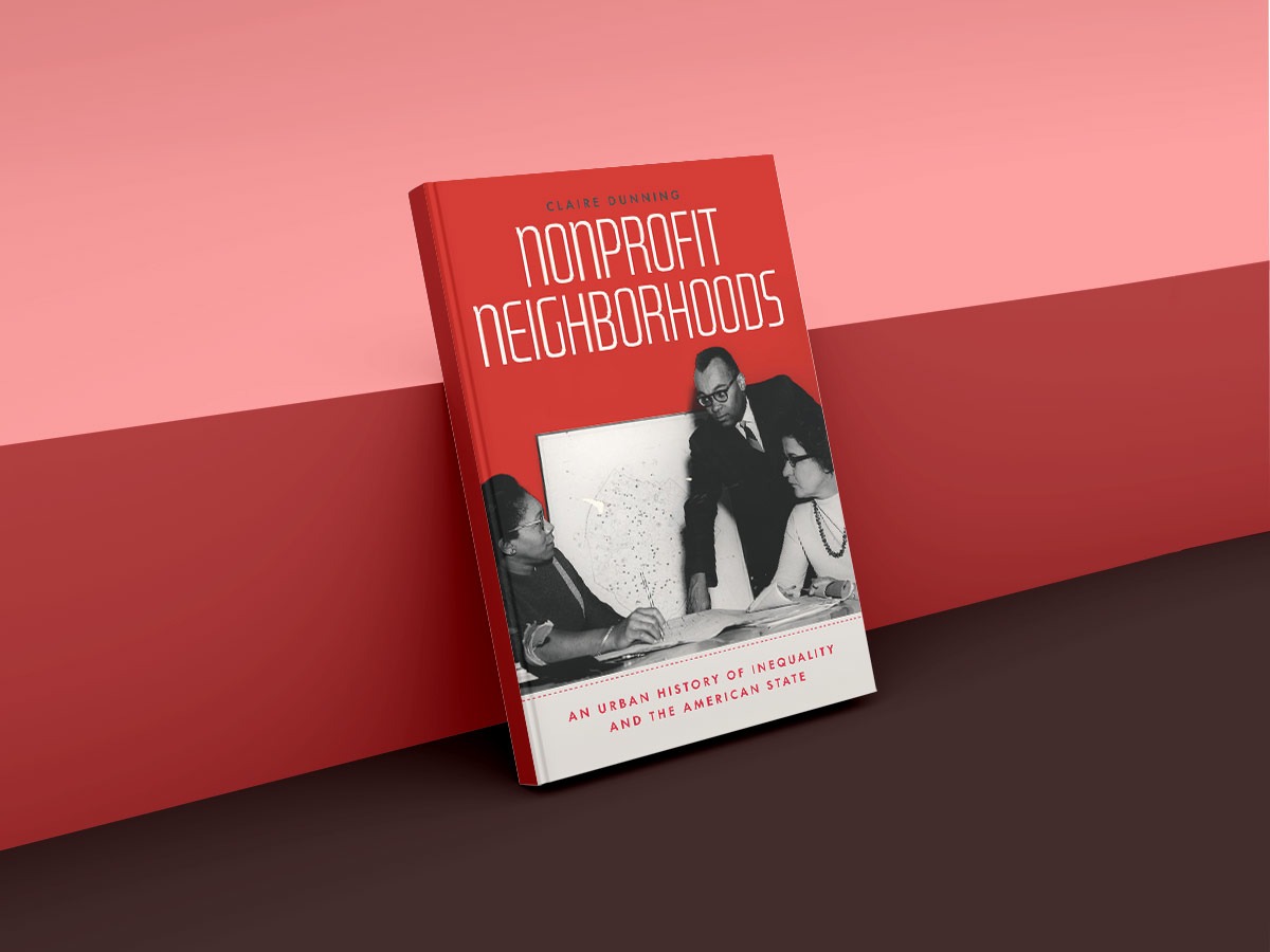 The book "Nonprofit Neighborhoods" leaning against a wall