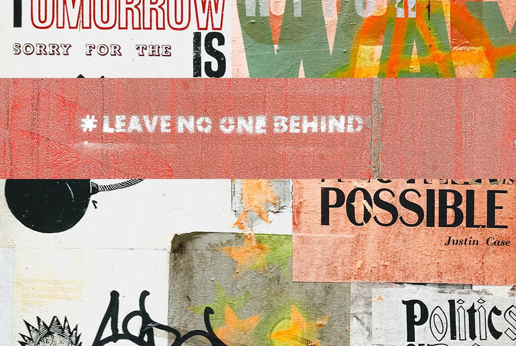 Solidarity Economy Image: A collage of phrases that reads "Leave No One Behind" 