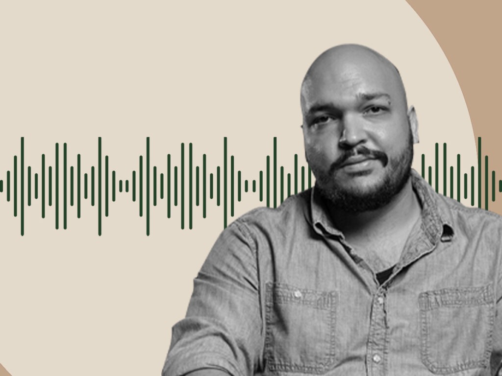 A black and white photo of speaker Maximillian Alvarez on a tan background. There is a green sound wave behind him.