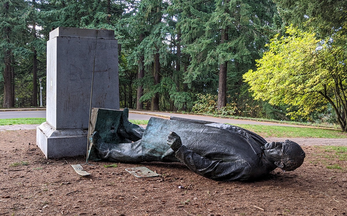 Harvey Scott statue on Mt. Tabor in Portland, Oregon, the morning after it was toppled by anti-colonizer and anti-racist activists.