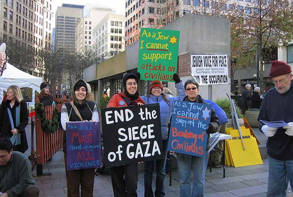 Jewish Voice for Peace-Seattle, Palestine Solidarity Committee, Voices of Palestine, Dyke Community Activists and Women in Black joined together to protest the Siege of Gaza in downtown Seattle on December 2nd.