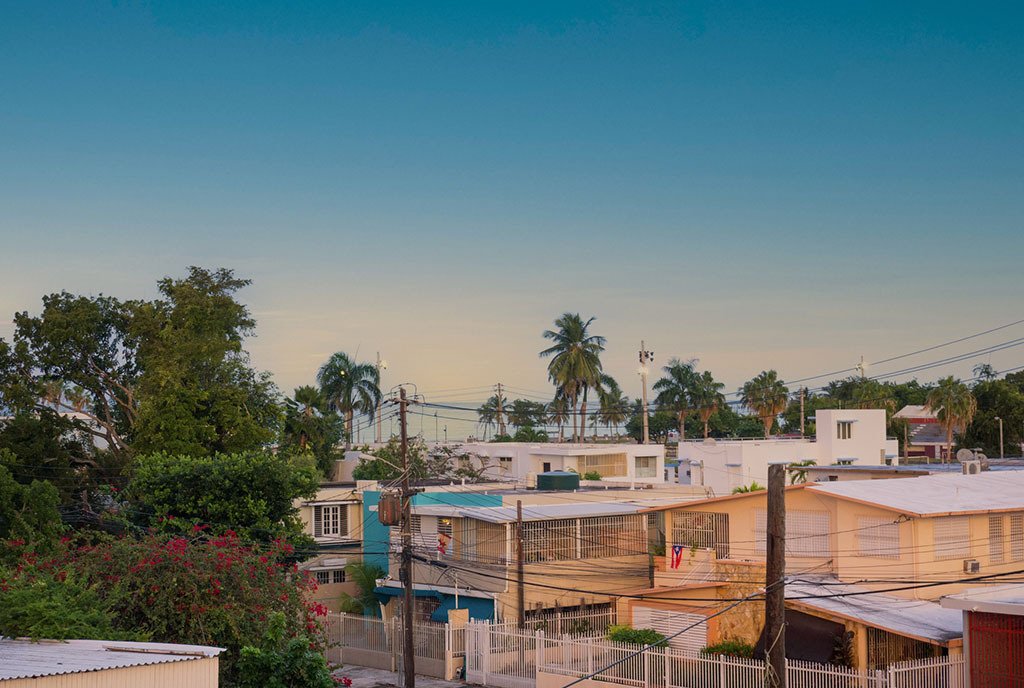 A residential area in Puero Rico, near Ocean Park in San Juan, during the sunset.
