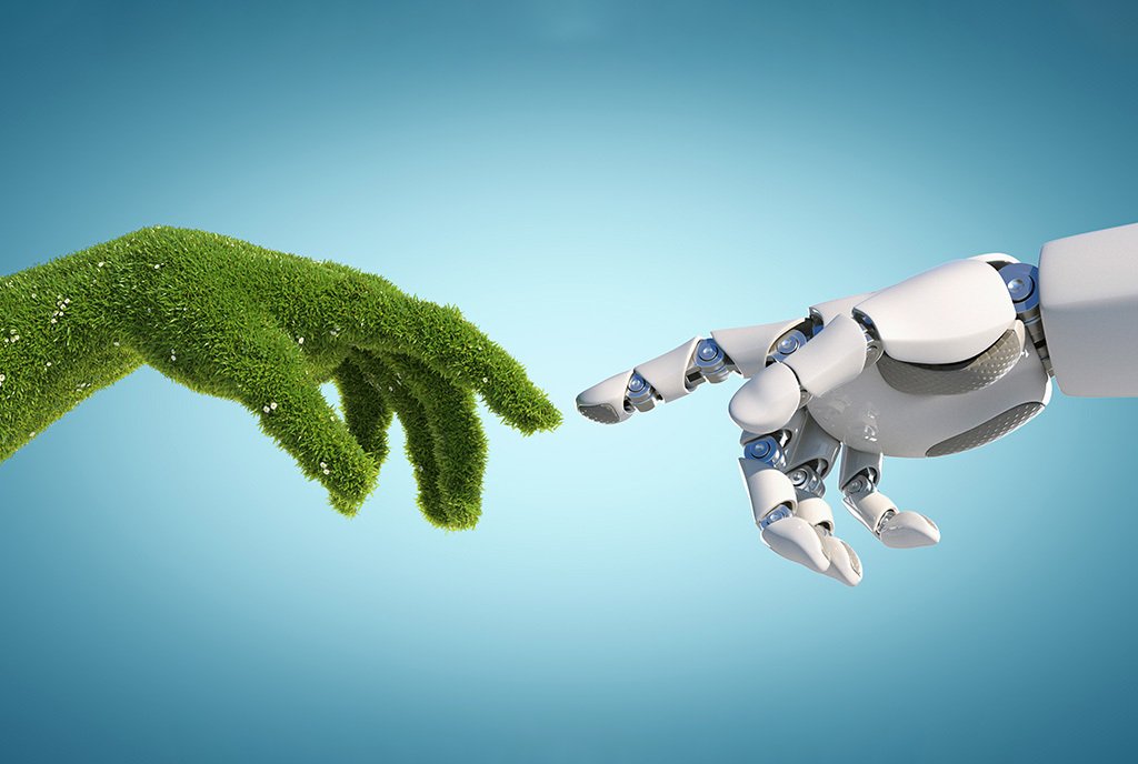 A robot hand and a natural hand covered in grass reach towards each other, just about to touch.