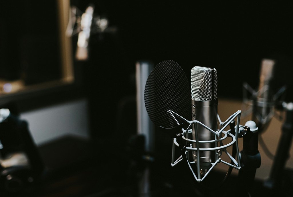 Unmanned condenser microphone in a radio station studio.
