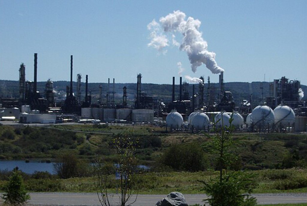 Smoke billowing from a smokestack of the Irving Oil refinery, in Saint John, New Brunswick.