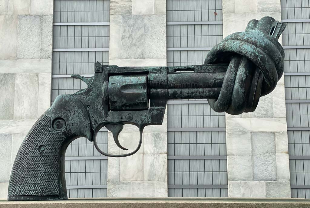 A large sculpture of a gun with the barrel twisted into a knot, which represents breaking the cycle of violence.