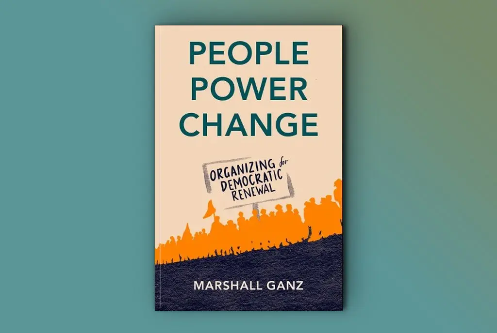 The interviewee’s book, People, Power, Change: Organizing for Democratic Renewal against a blue background.