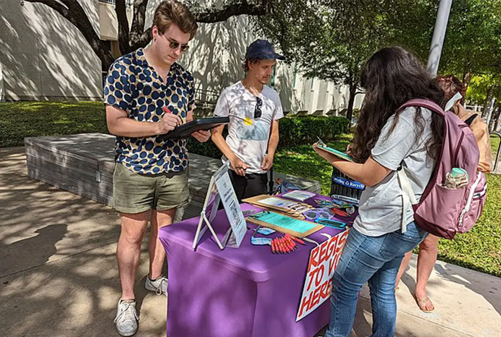 A organization registering people to vote while demonstrating political neutrality in the lead up to an election. Voter Registration drives represent permissible advocacy and civic engagement actions for nonprofits.