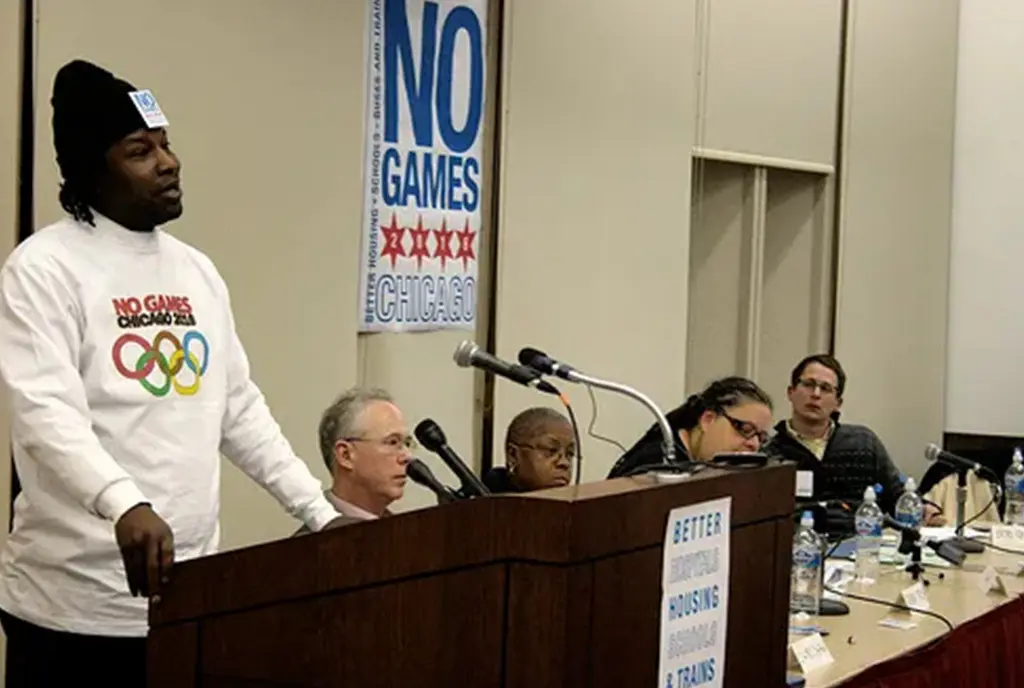 A community member and “No Games Chicago” supporter, arguing at a press conference that the city of Chicago should invest money in better schools, housing, and public transportation instead of an Olympic bid.