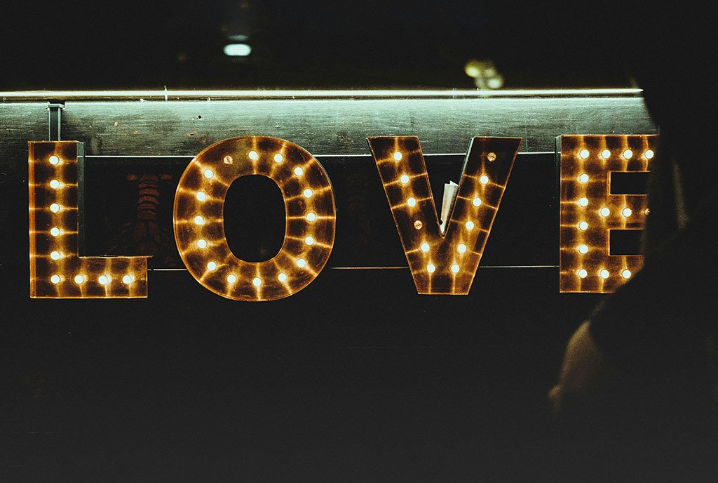 A Lightbox sign simply reading, “LOVE”