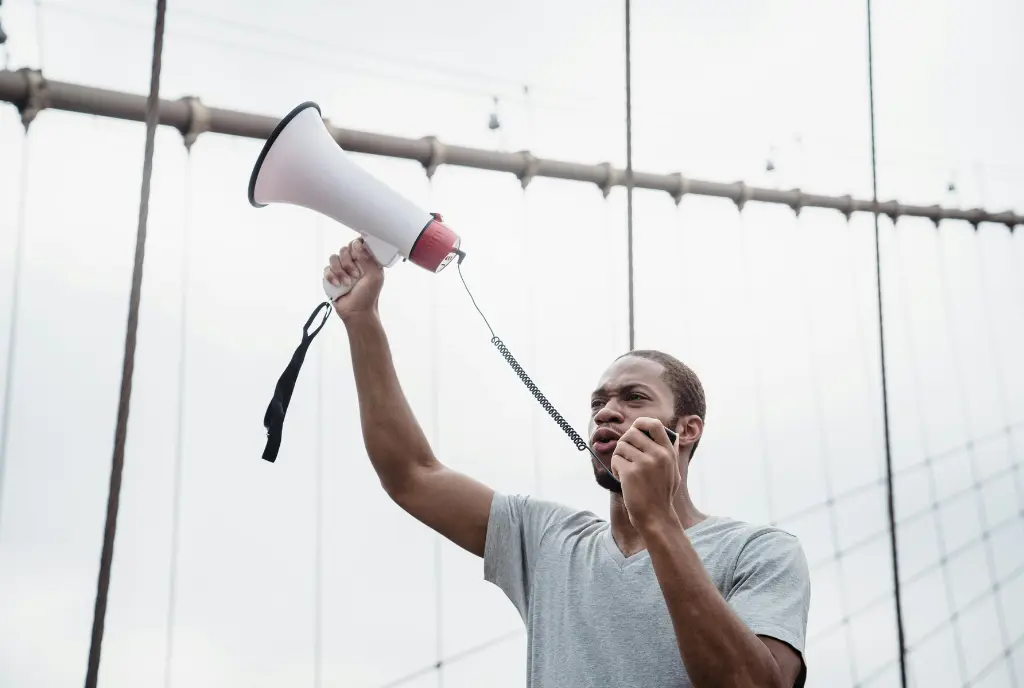 Protestor holds a megaphone