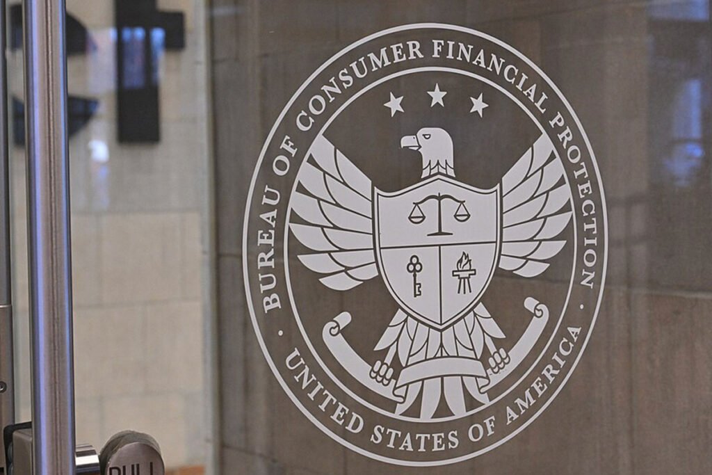 The exterior of the Consumer Financial Protection Bureau in Washington, D.C.. The building is empty, suggesting the mass layoffs of employees.
