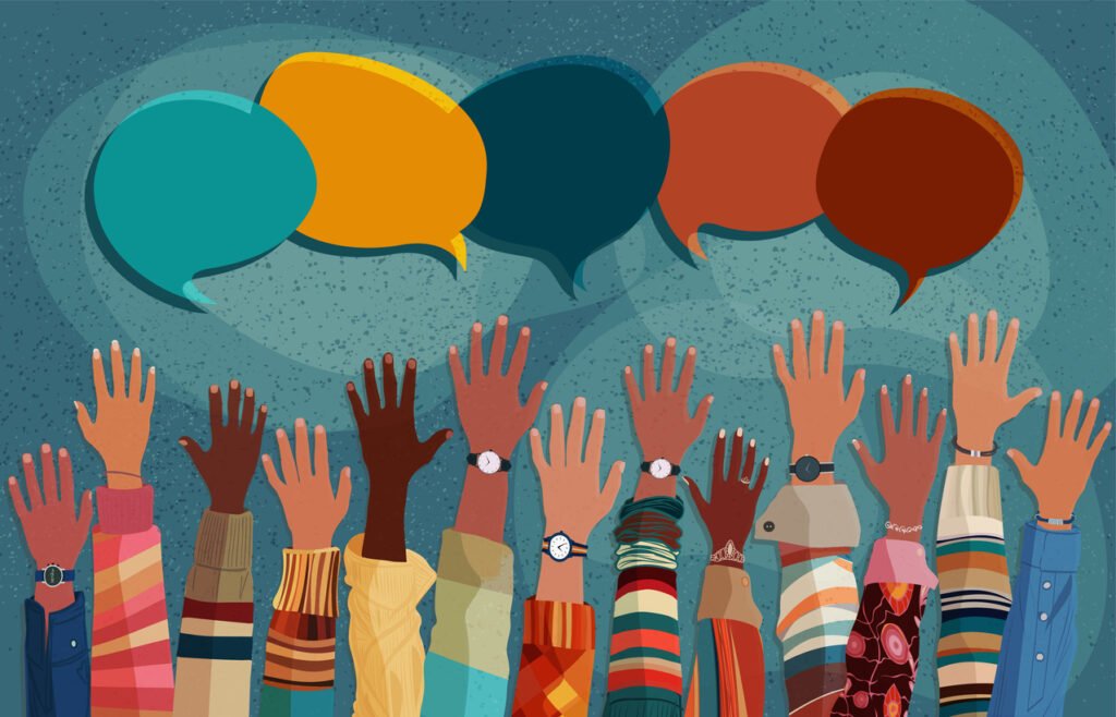 Raised hands of diverse, multicultural group of people in communication with each other.