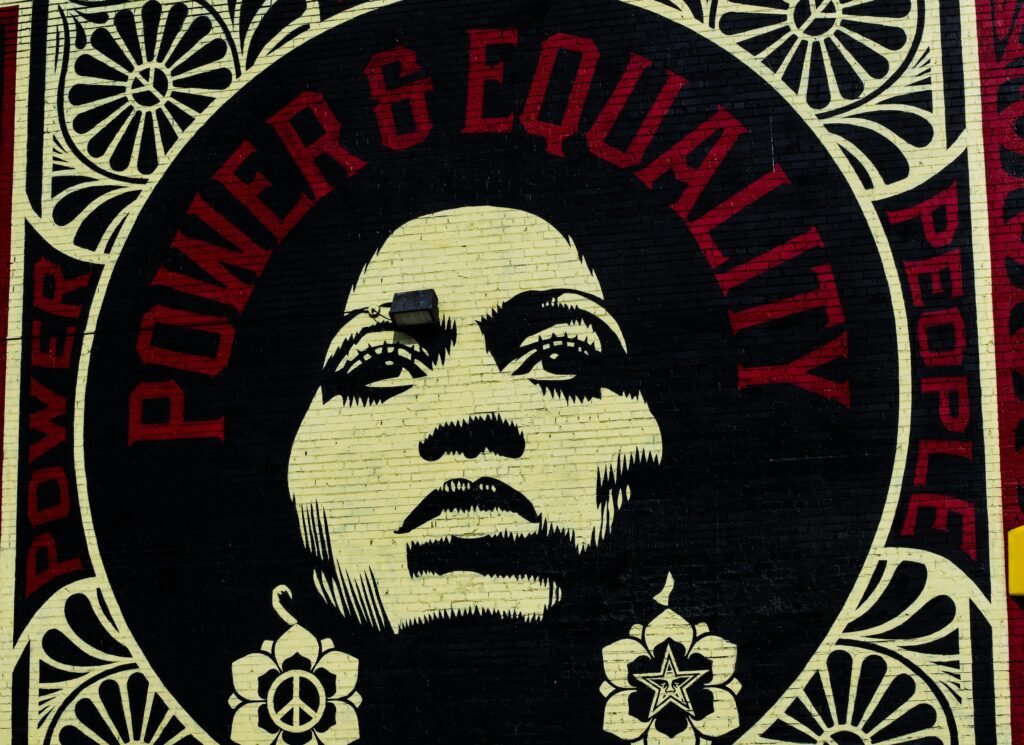Mural of a woman that reads “POWER & EQUALITY.”