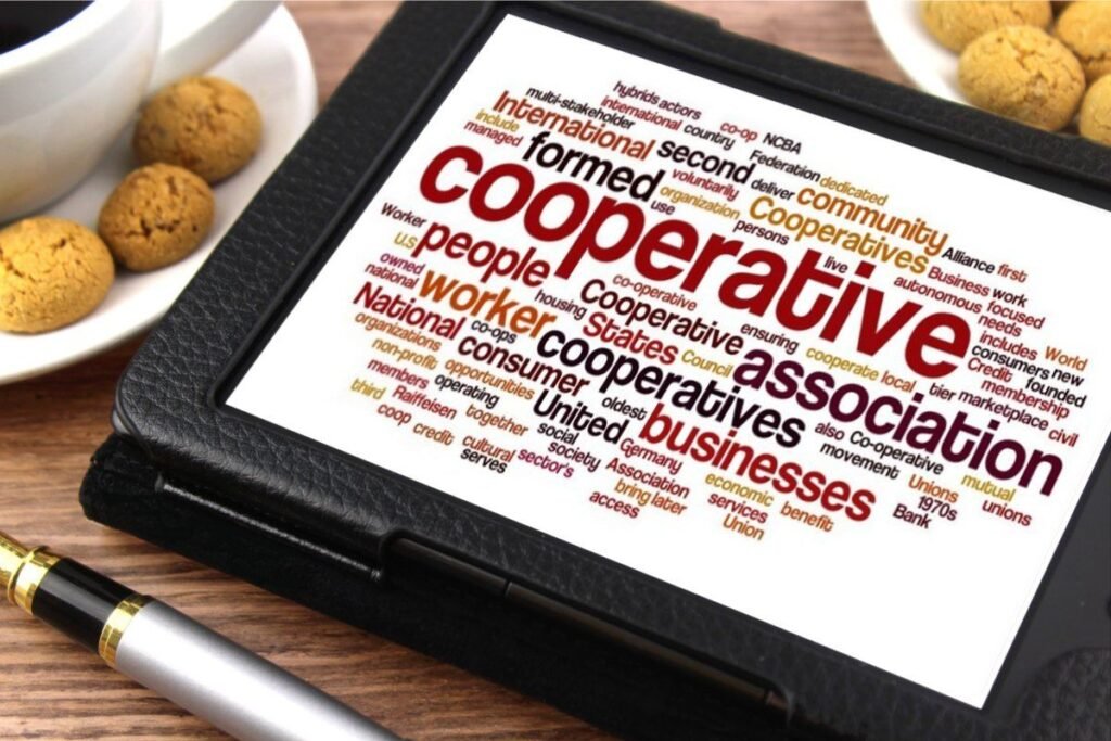 A cooperative world cloud. Other words that appear in large letters include people, workers, association, and businesses.