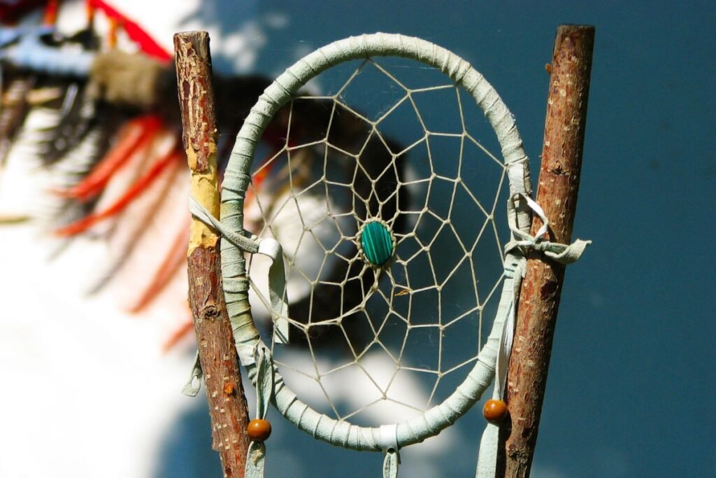 A Native American dream catcher, a net that protects the sleeper from negative dreams, while letting positive dreams through.