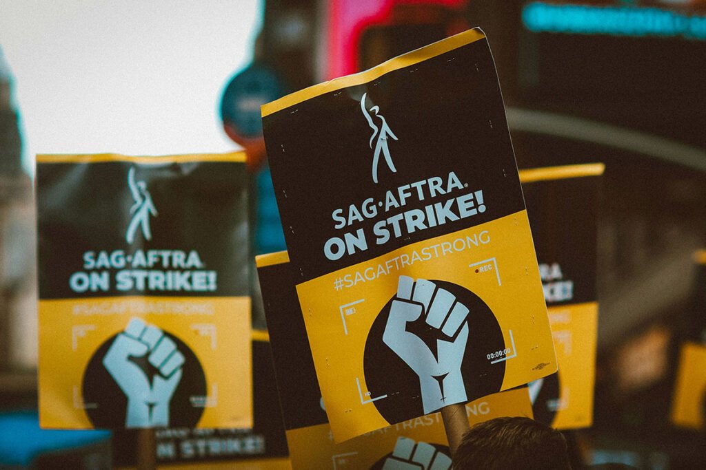 Protest signs from a SAG AFTRA strike, representing a continuation of a long tradition of striking for dignity and economic justice.