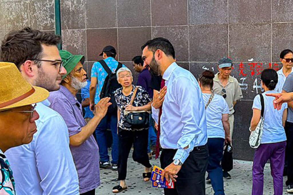 Mayor elect Zohran Mamdani Campaigning in Flushing, NY with a diverse crowd.