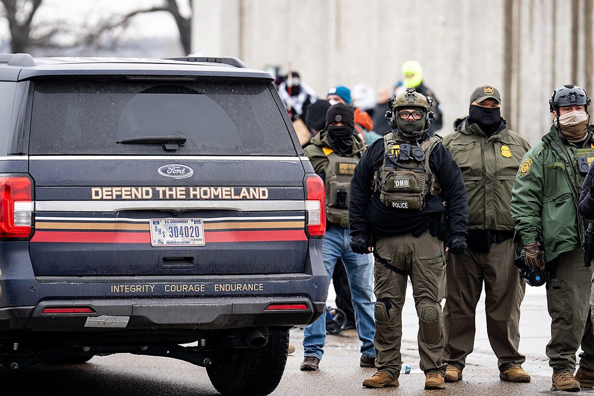 A US Government SUV with "Defend The Homeland" "Integrity, Courage, Endurance" written on it as seen in Minneapolis on January 8, 2026.
