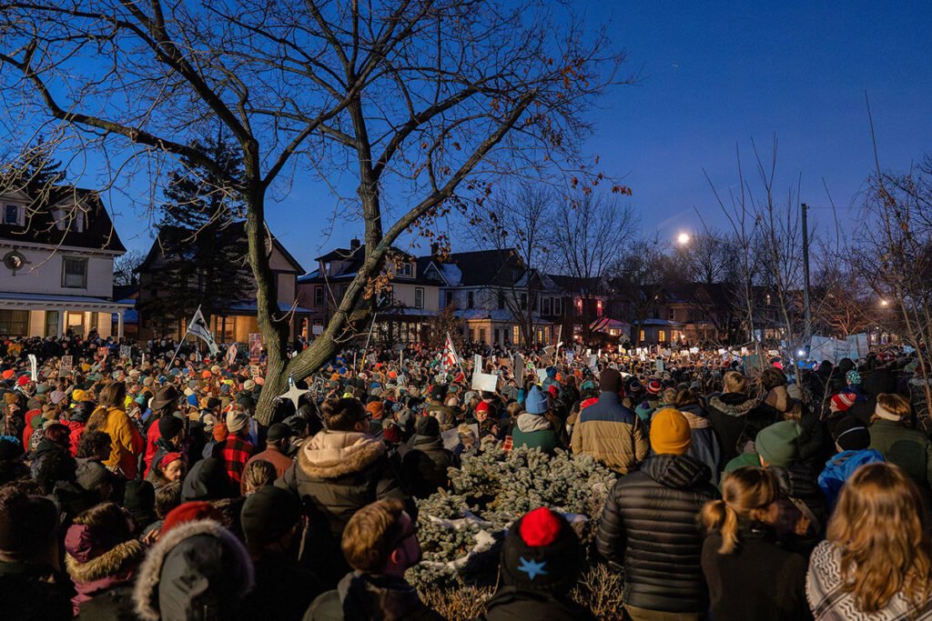 A crowded evening vigil for Renee Good in South Minneapolis.