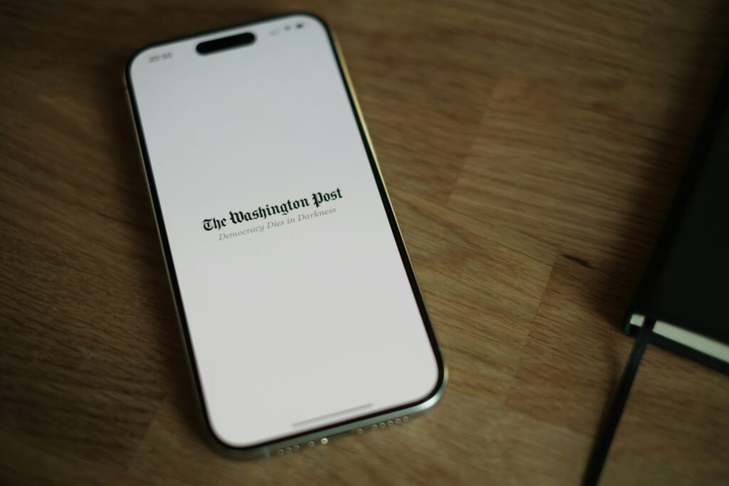 The Washington Post pulled up on the screen of an Apple iPhone.