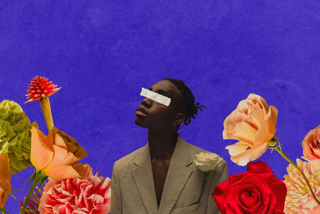 A composite of a Black man in a field of cut-out roses, but his eyes are covered so he cannot see the roses.