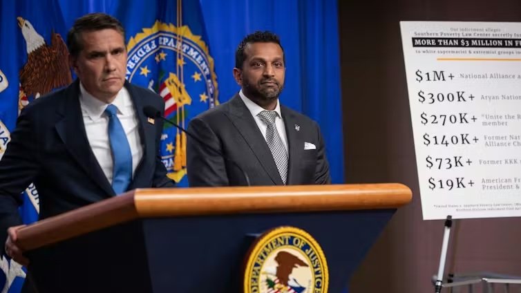FBI Director Kash Patel, right, and acting Attorney General Todd Blanche speak about the Southern Poverty Law Center’s indictment in April 2026. Nathan Posner/Anadolu via Getty Images
