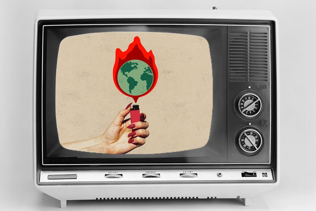 A vintage television dispalying an image of a woman’s hand lighting planet earth on fire with a handheld lighter.