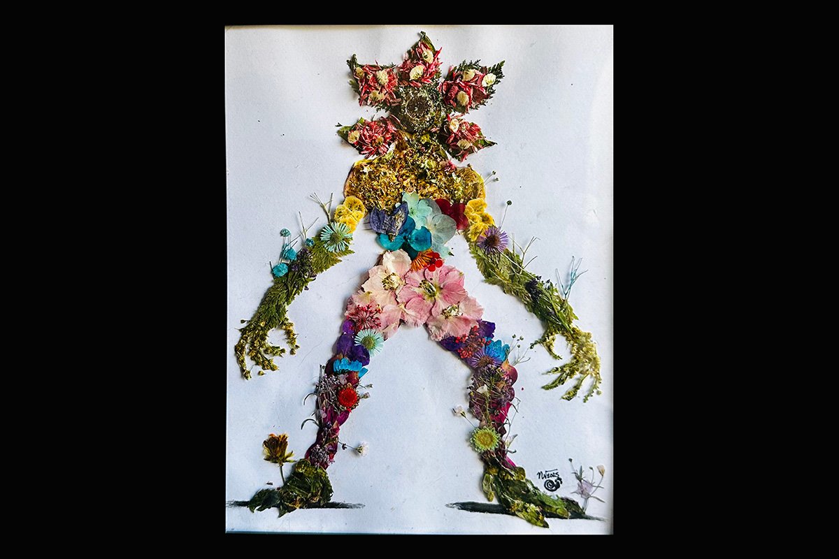 An oshibana artwork depicting a demagorgon made of flowers, leaves, and other dried flora.
