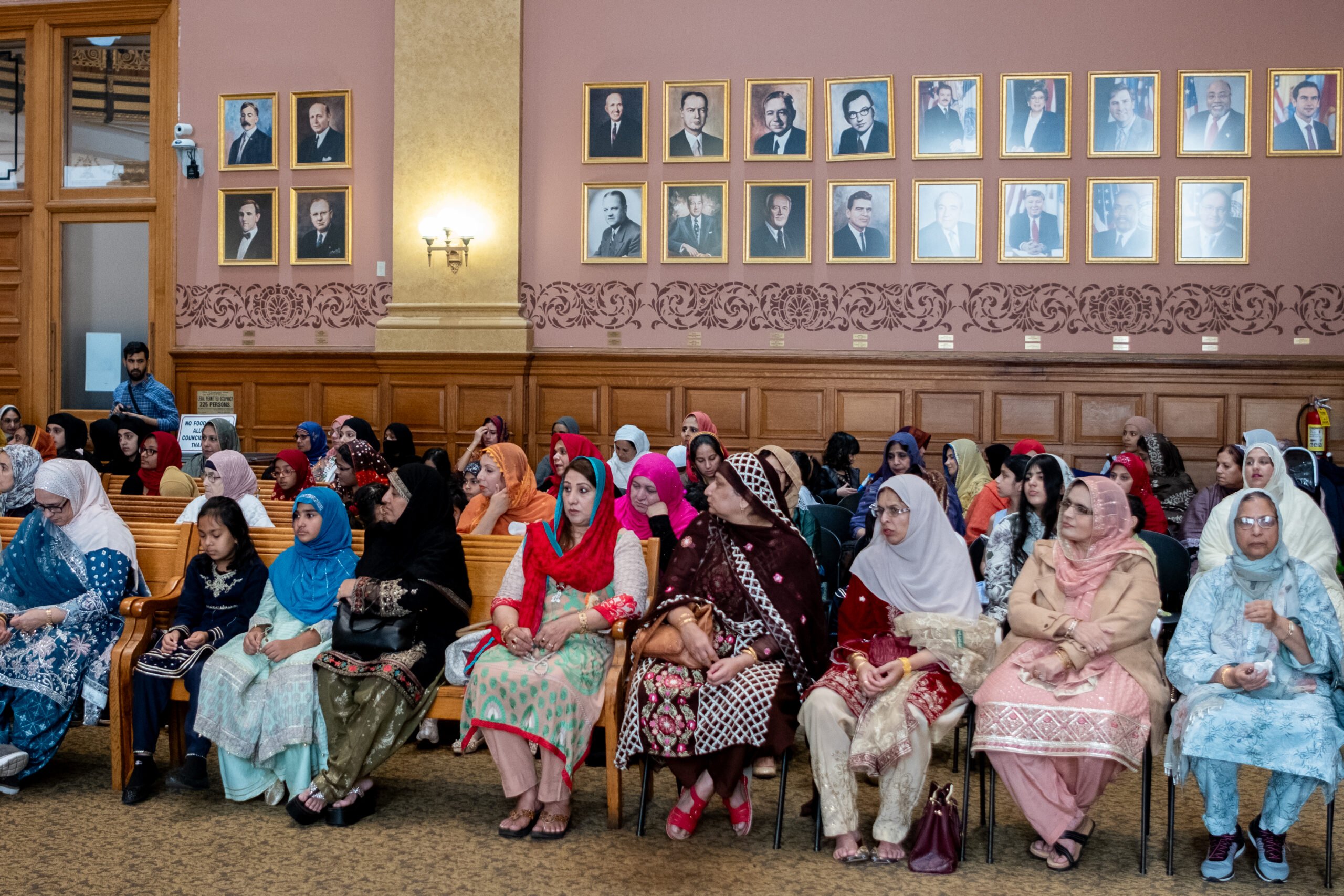 City Hall, Jersey City | American Muslim Experience documentaryMuslim women in the Council Chambers at the City Hall of Jersey City. They were listening to the local politicians and religious scholars at a gathering celebrating holiday. Photography by Syed Yaqeen.