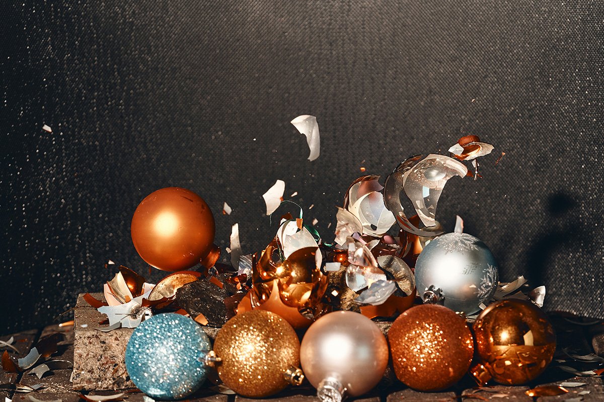 A scene of Christmas ornaments crashing into each other and shattering.